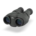 Canon 10x30 IS II binoculars showing the objective lenses, focus wheel and stabiliser button