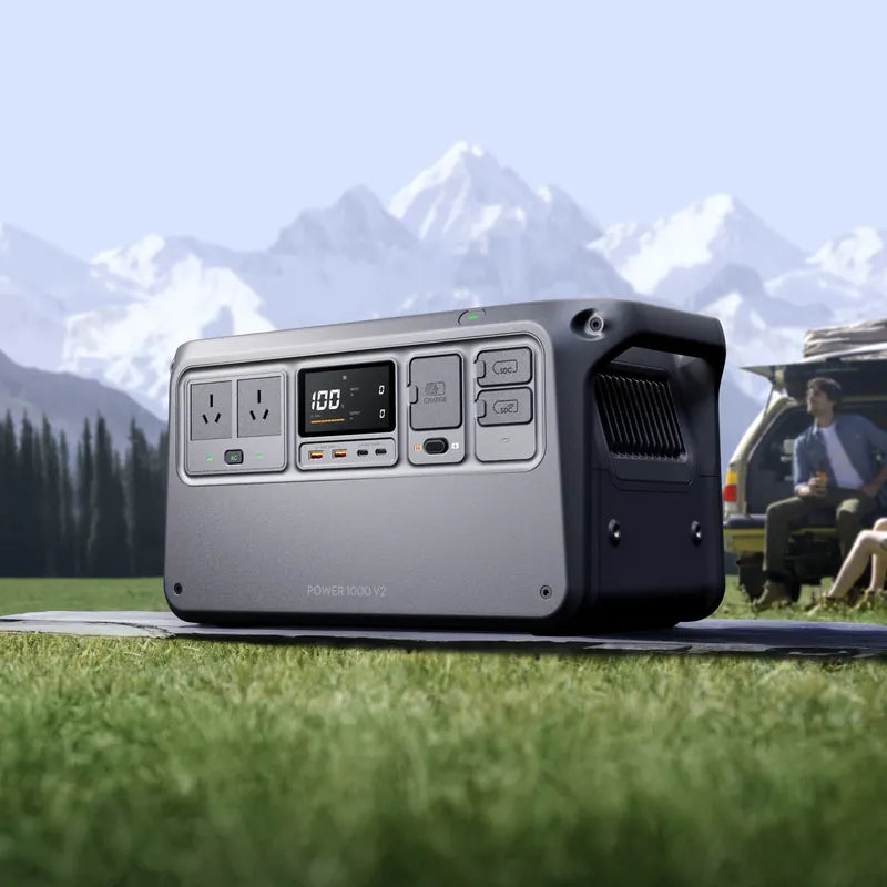 DJI Power 1000 V2 portable power station at an outdoor campsite