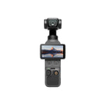 DJI Osmo Pocket 4 front facing with landscape on screen