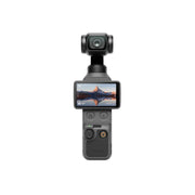 DJI Osmo Pocket 4 front facing with landscape on screen