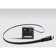 DJI Power 1000 Mini with retractable cable on grey background